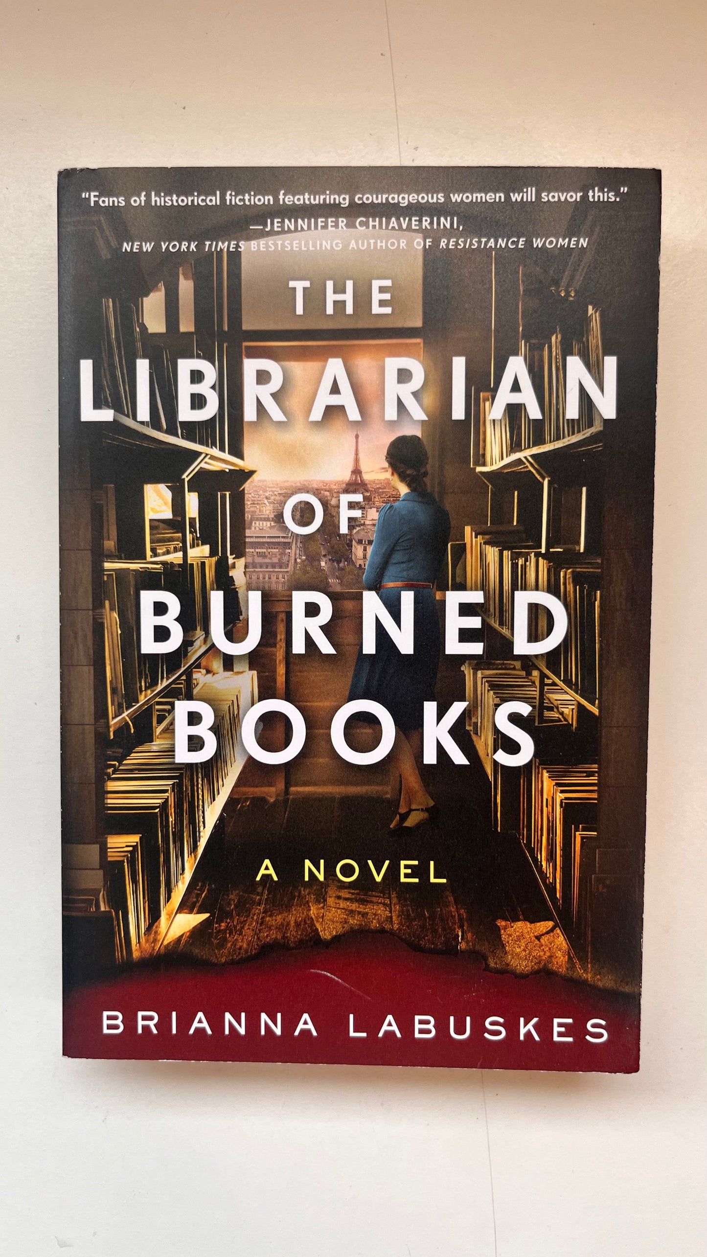 Book cover of 'The Librarian of Burned Books' by Brianna Labuskes on a white background