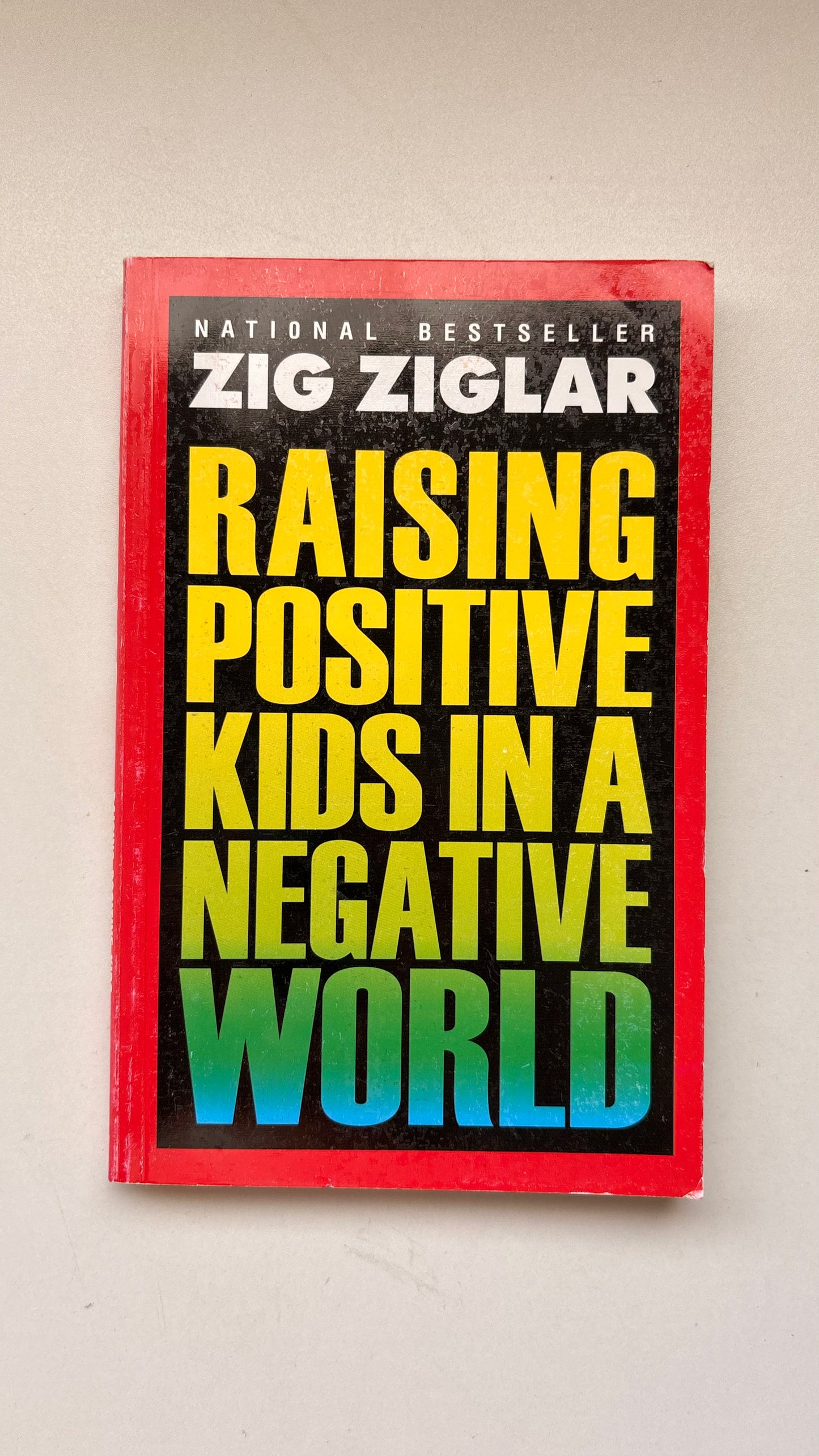 Raising positive kids in a negative world by Zig Ziglar