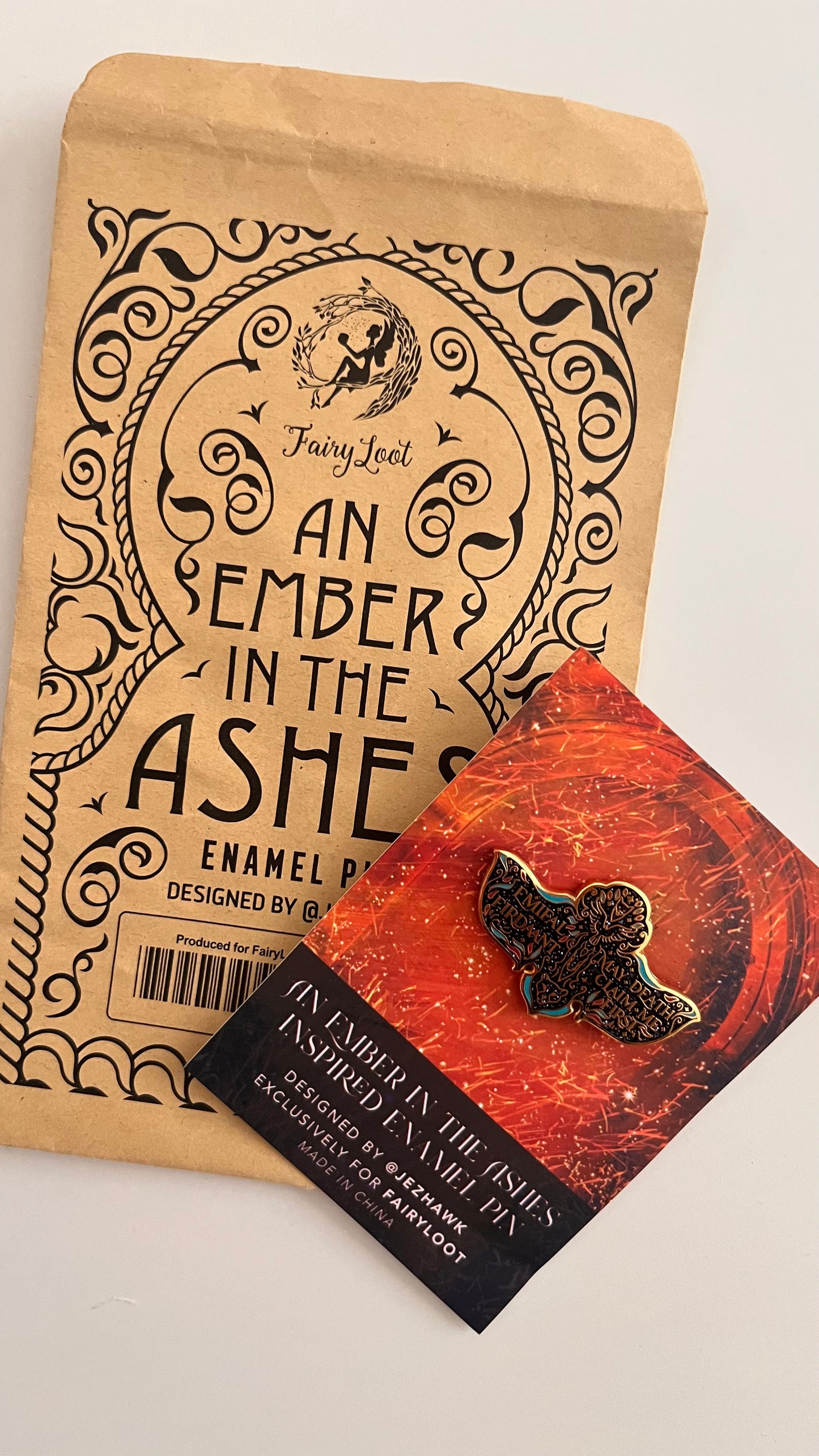 An Ember In The Ashes Enamel Pin