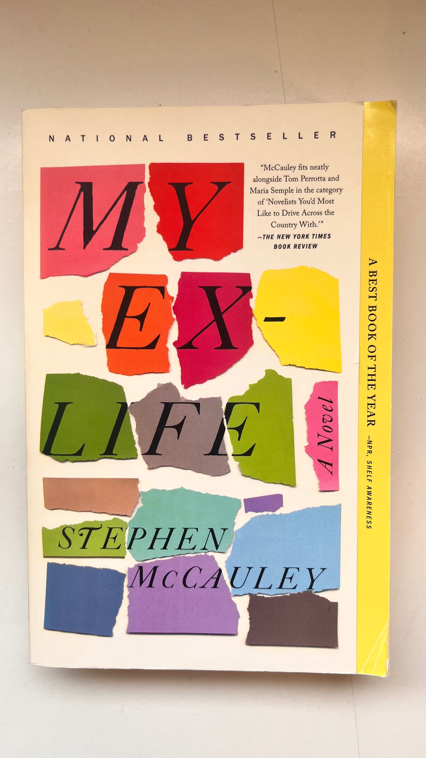 Book cover of 'My Ex-Life' by Stephen McCauley with colorful text design on a beige background