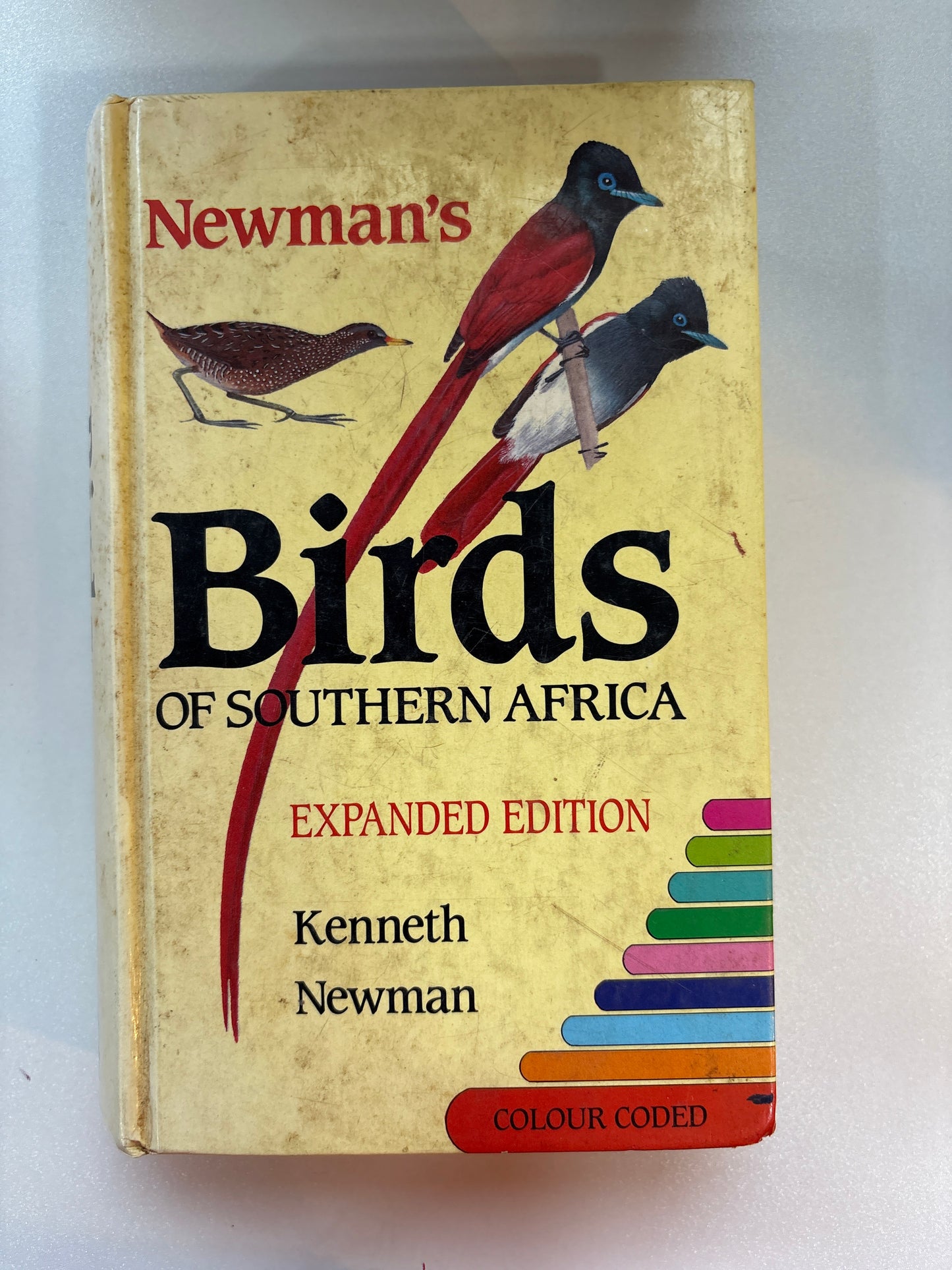 Book titled 'Birds of Southern Africa' by Kenneth Newman on a white background