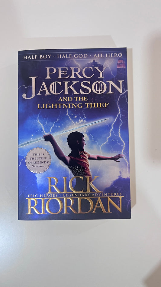 Percy Jackson & The Lightning Thief by Rick Riordan – Fantasy adventure book.