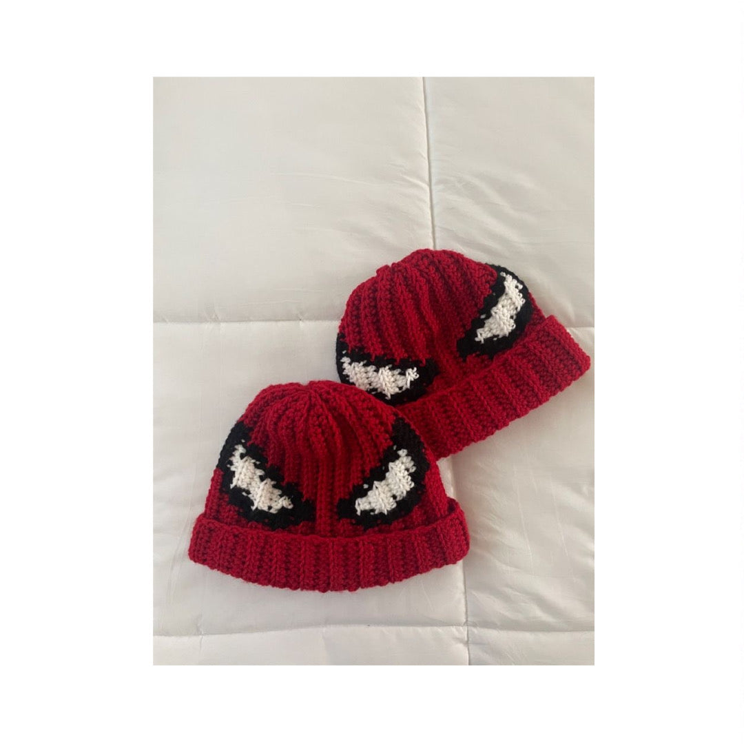 Crochet beanie featuring Spider-Man design in red and black