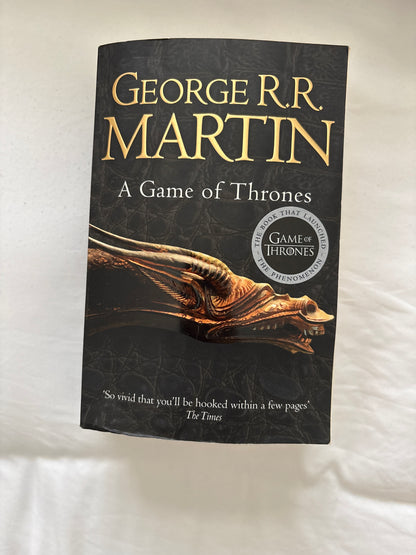 A game of thrones by George R.R. Martin (paperback)