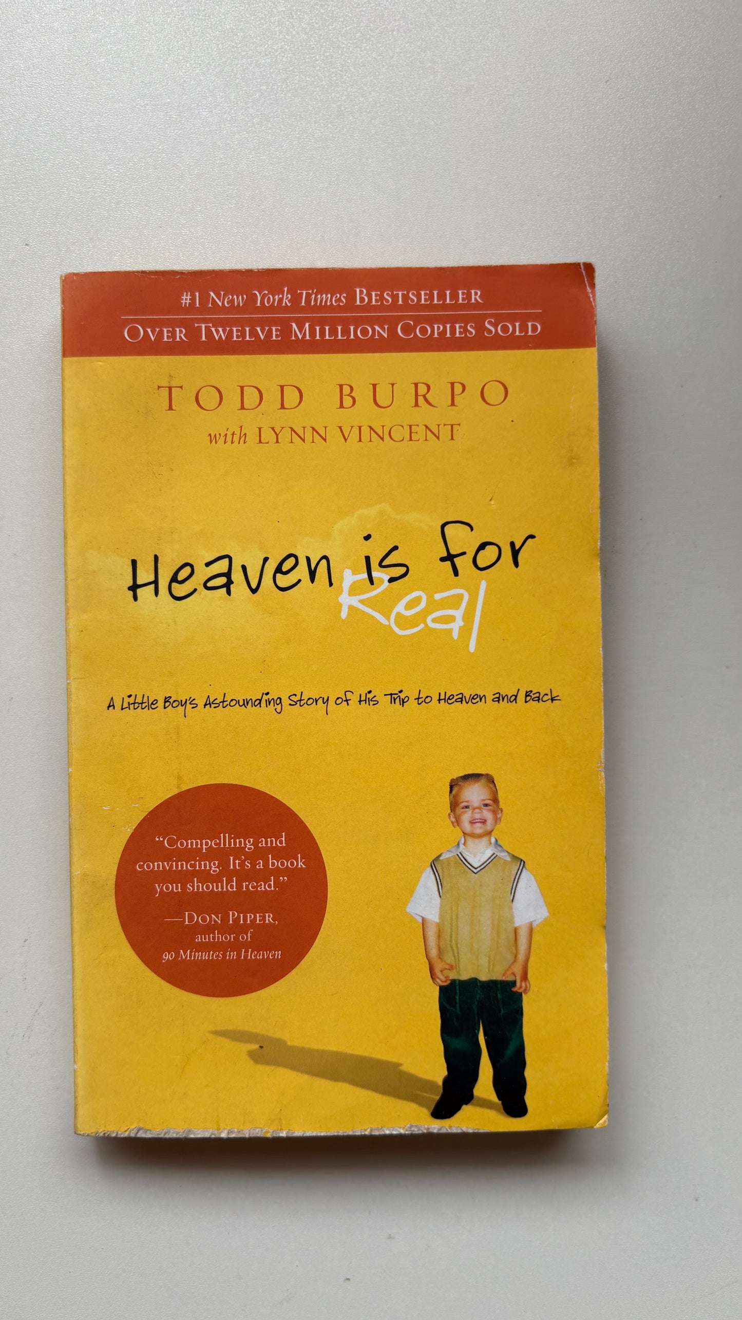 Heaven is for real by Todd Burpo ( Paperback)