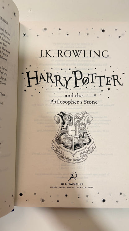 Harry Potter and the philosophers stone by J.K. Rowling (Hardcover)
