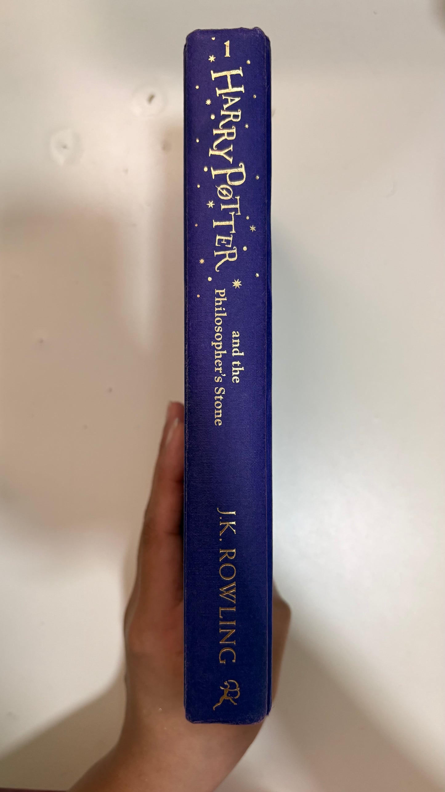 Harry Potter and the philosophers stone by J.K. Rowling (Hardcover)