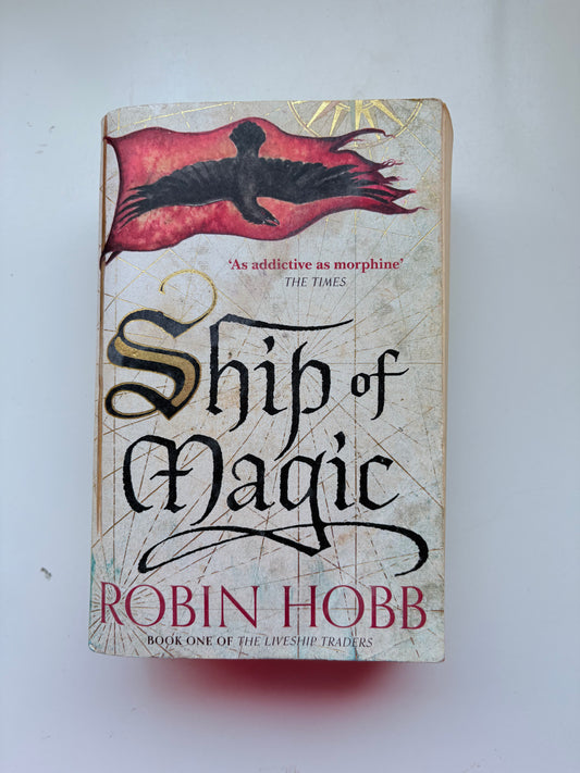 Book titled 'Ship of Magic' by Robin Hobb on a white background