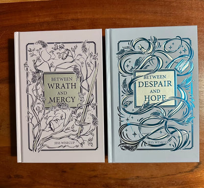 Bookish book: Between wrath and mercy by Jess Wisecup (Hardcover)