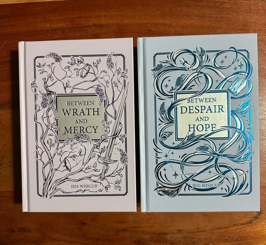 Bookish book: Between wrath and mercy by Jess Wisecup (Hardcover)