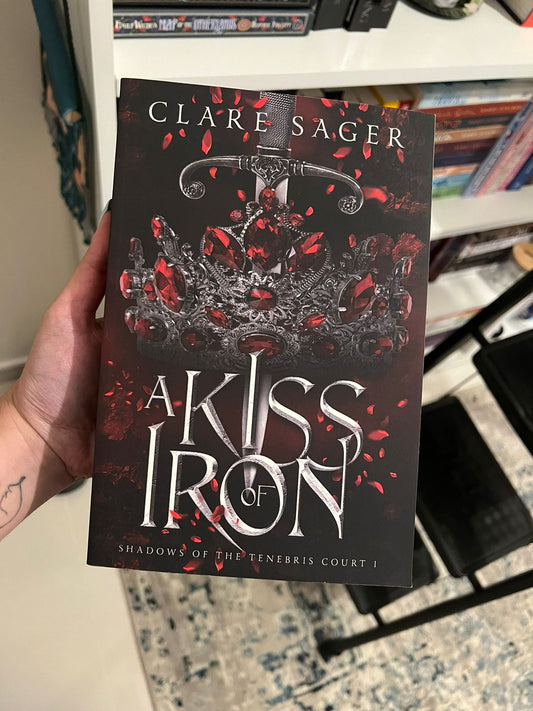 A kiss of Iron by Clare Sager (paperback)