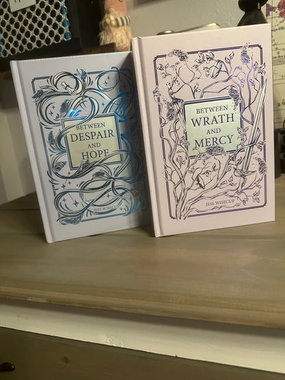 Bookish book: Between wrath and mercy by Jess Wisecup (Hardcover)