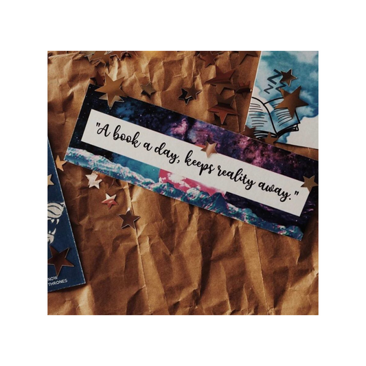 Decorative bookmark with motivational quote on a textured surface