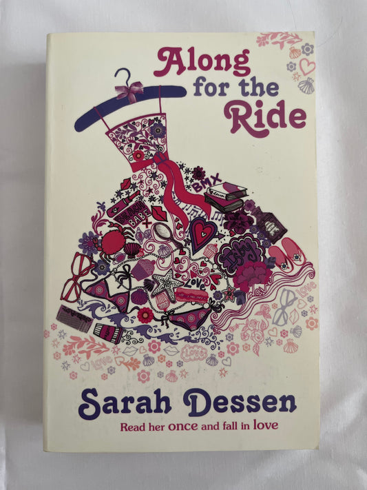 Cover of Along for the Ride by Sarah Dessen featuring a beach bike ride with soft blue tones and dreamy vibes.