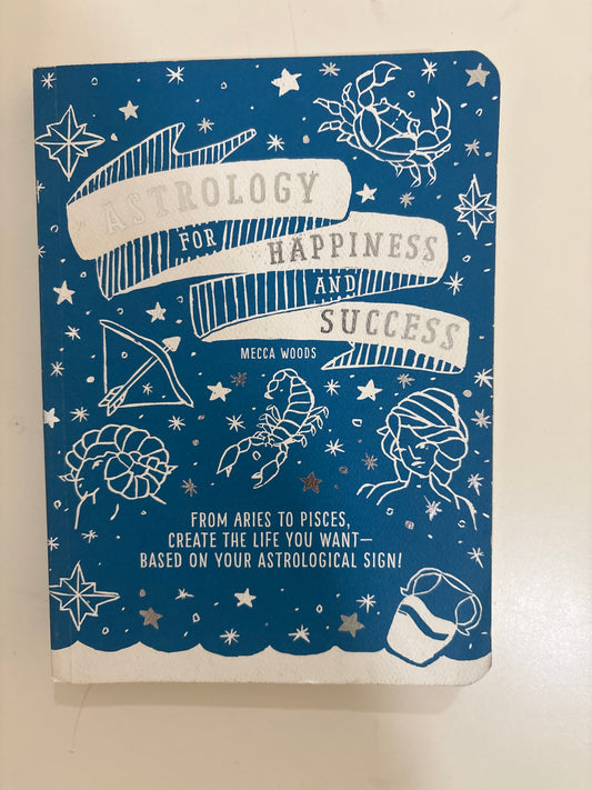 Astrology for Hapiness And Sucess by Mecca Woods : Book cover with astrological designs and text on a blue background