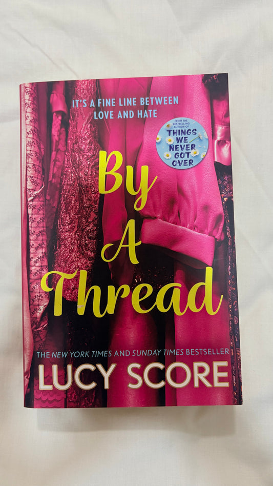 By a thread by Lucy score (Paperback)