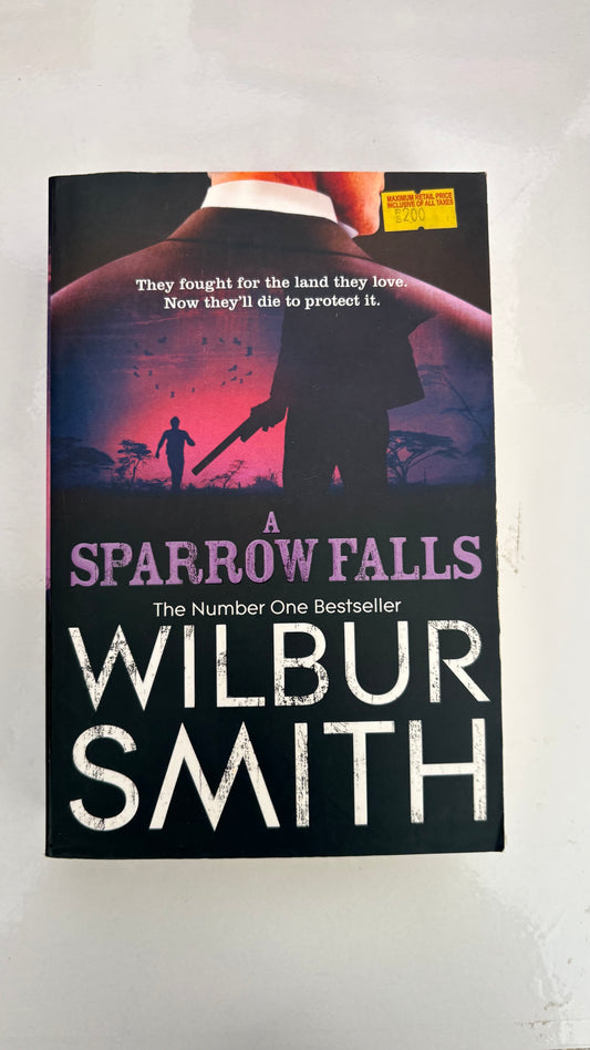 A sparrow falls by Wilbur Smith (Paperback)
