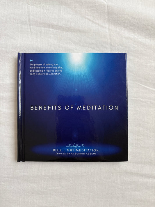 Blue packaging with 'Benefits of Meditation' text on a white fabric background