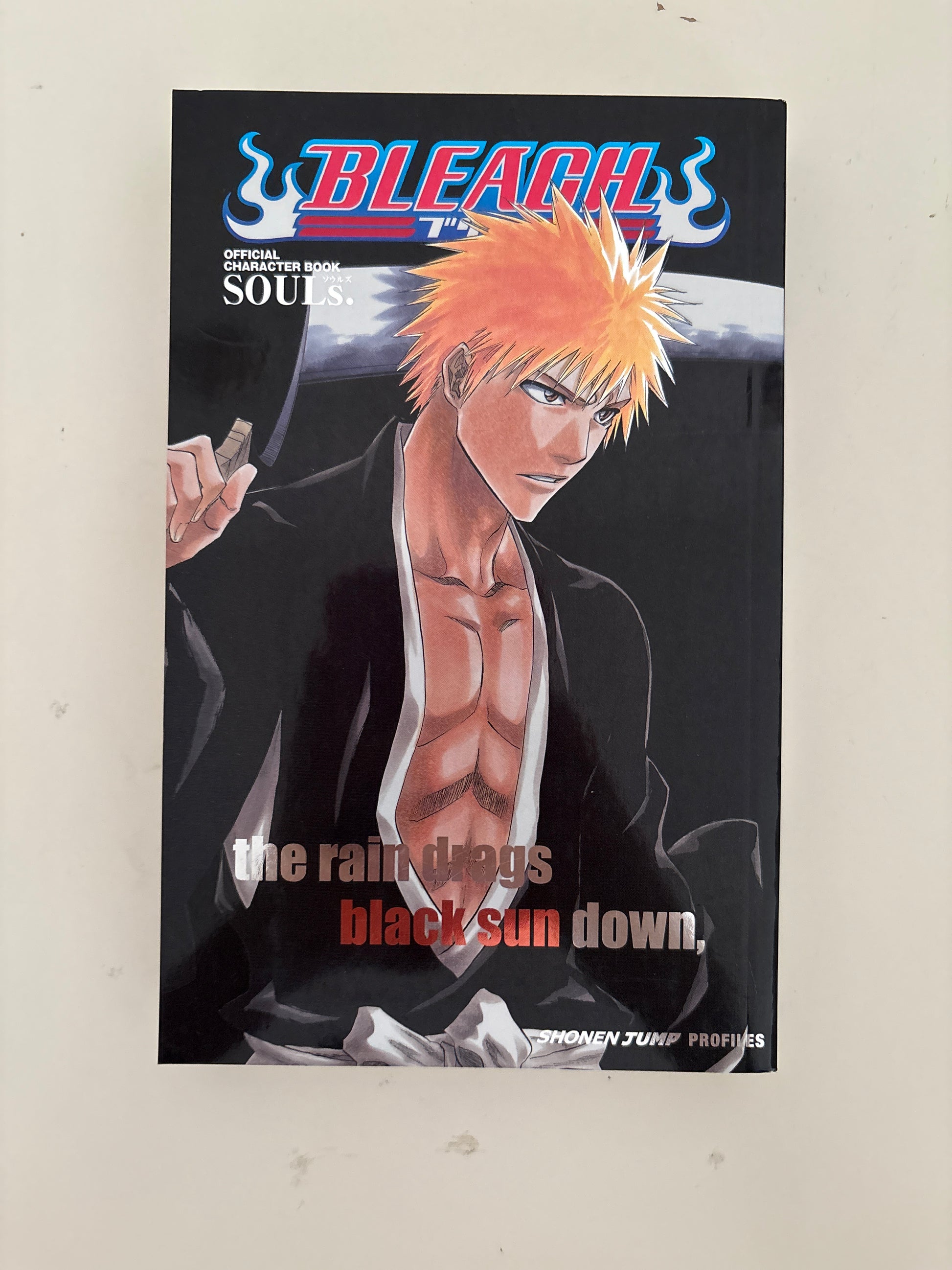 Comic book cover of 'Bleach' with a character in a dynamic pose on a black background.