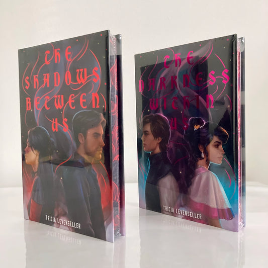 Two books titled 'The Shadows Between Us' and 'The Darkness Within Us' by Tricia Levenseller on a white background.
