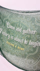Book cover with decorative text and patterns on a green background