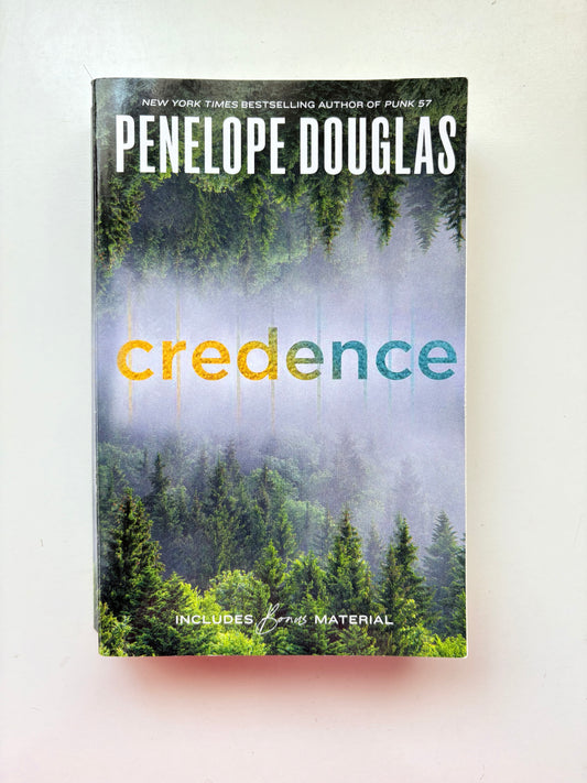 Book cover of 'Credence' by Penelope Douglas with a forest design.