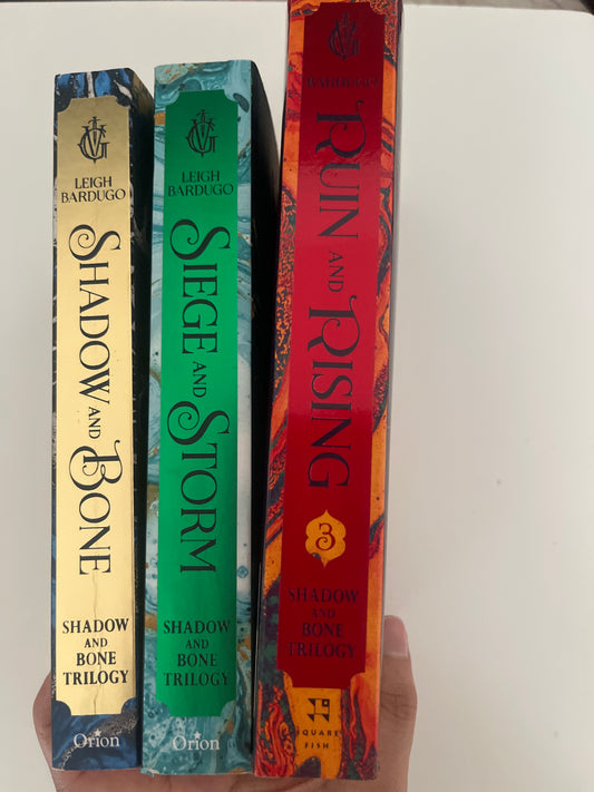 Shadow and bone trilogy by Leigh Bardugo (Paperback)