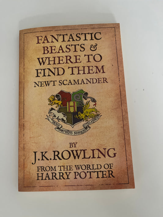 Book cover of 'Fantastic Beasts and Where to Find Them' by J.K. Rowling on a white background