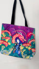 Tote bag with a colorful dragon design on a white background