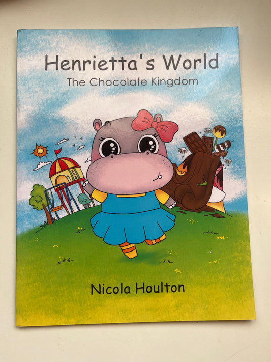 Book cover of Henrietta's World: The Chocolate King, featuring colorful illustrations and a chocolate-themed adventure.


