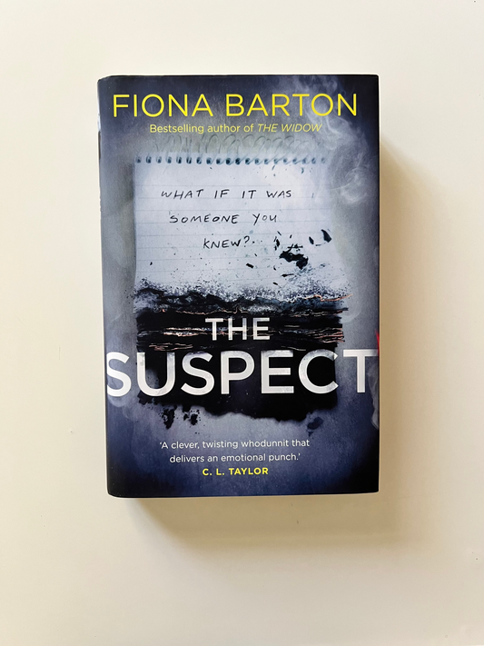 Book titled 'Suspect' by Fiona Barton on a white background