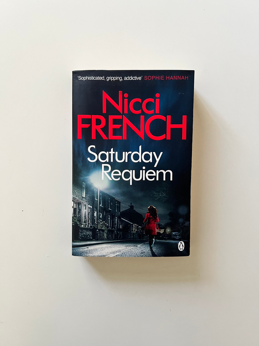 Book titled 'Saturday Requiem' by Nicci French on a white background