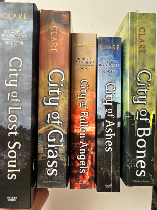 The Mortal Instruments series By Casandra Clare (Paperback)