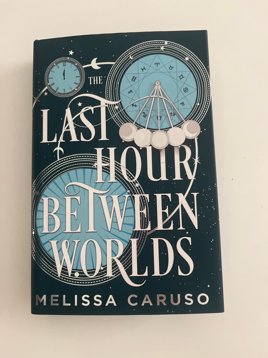 Book titled 'The Last Four Hours Between Worlds' by Melissa Caruso on a light background