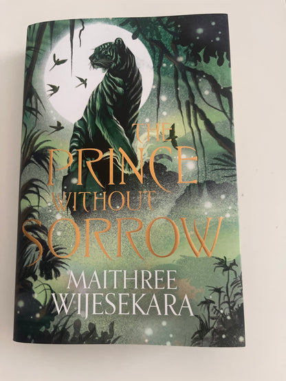 Book cover of 'The Rice Without Sorrow' with a tiger and moon illustration on a white background