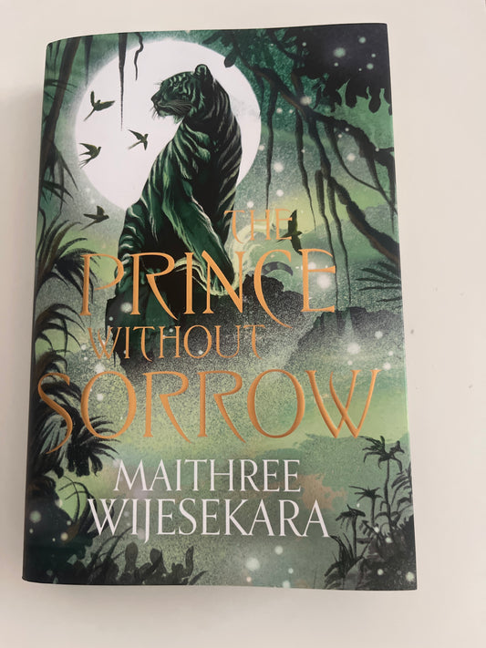 Book cover of 'The Rice Without Sorrow' with a tiger and moon illustration on a white background