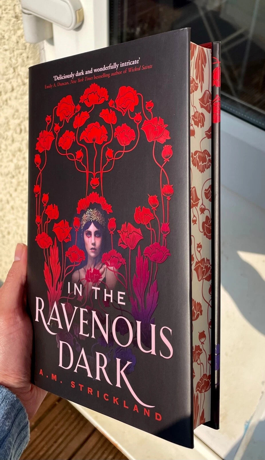Illumicrate edition of In the Ravenous Dark by A.M. Strickland