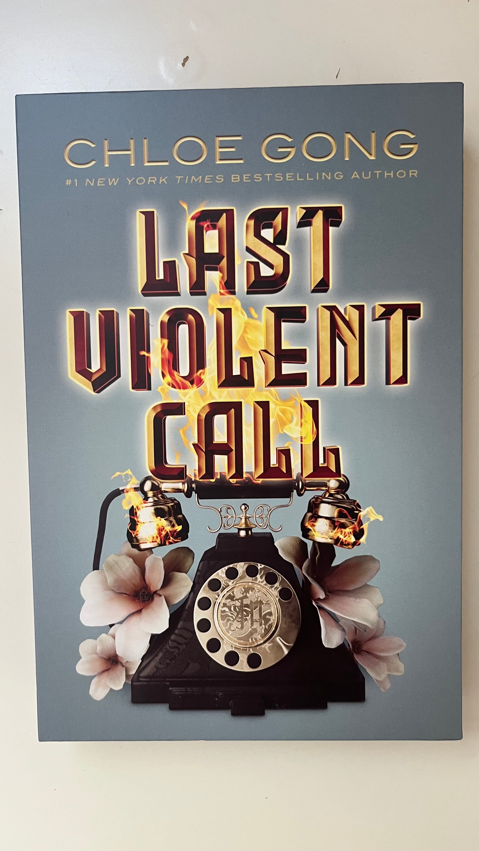 Hardcover set of Last Violent Call by Chloe Gong featuring two novellas with matching covers in a historical fantasy setting.

