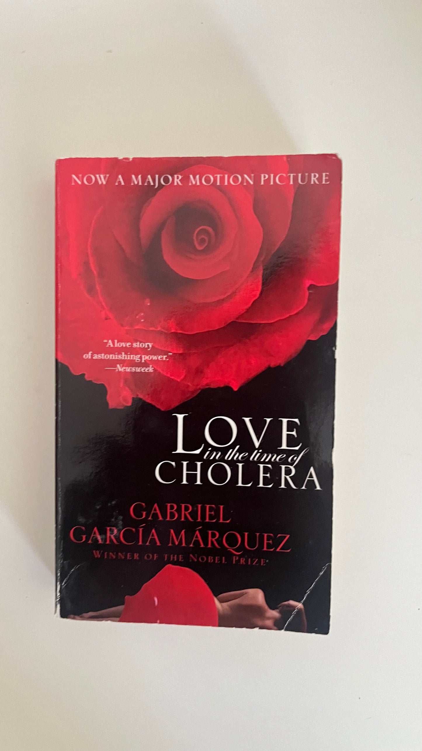 Paperback of Love in the Time of Cholera with classic artwork evoking the Caribbean and enduring love.

