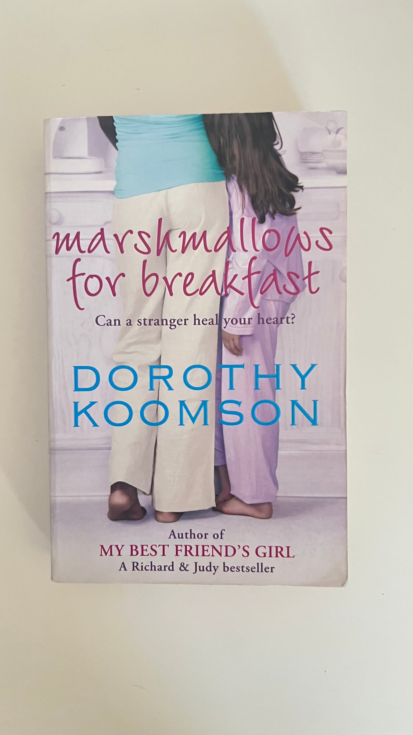 Paperback of Marshmallows for Breakfast by Clare Dowling with a cheerful and light-hearted cover.

