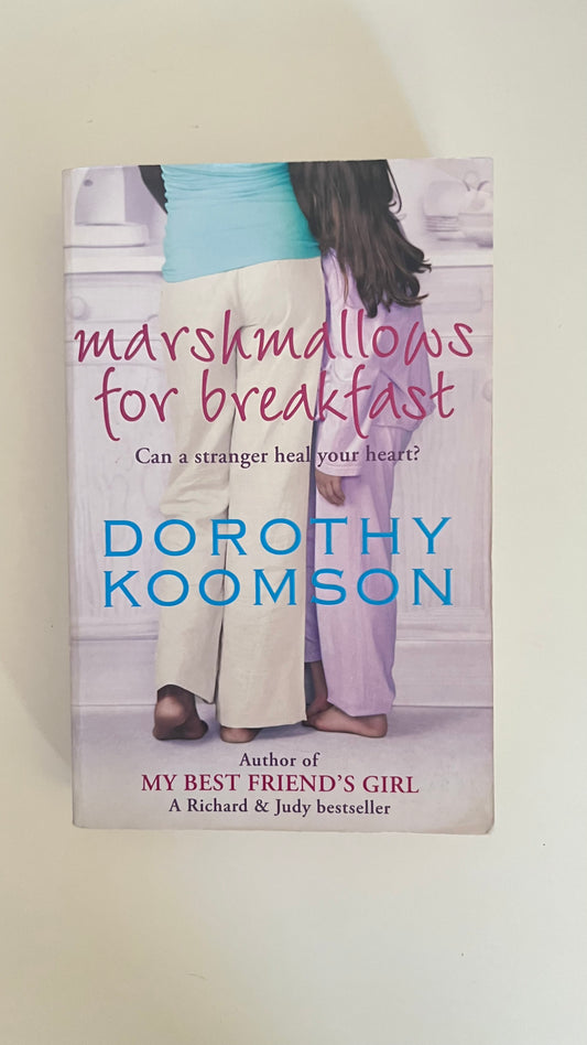Paperback of Marshmallows for Breakfast by Clare Dowling with a cheerful and light-hearted cover.

