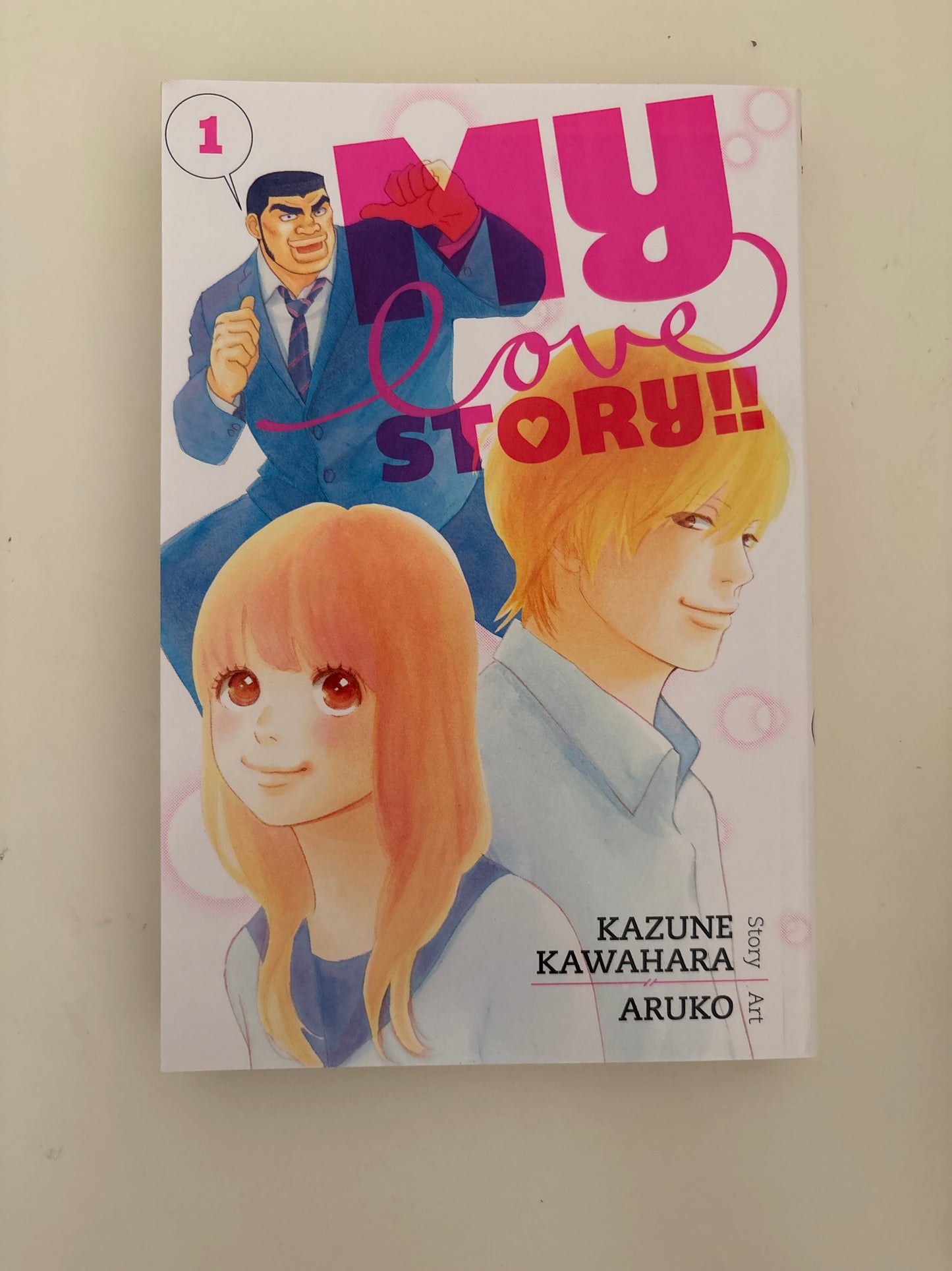 Book cover of 'Boku no Love Story' with two characters and colorful design.