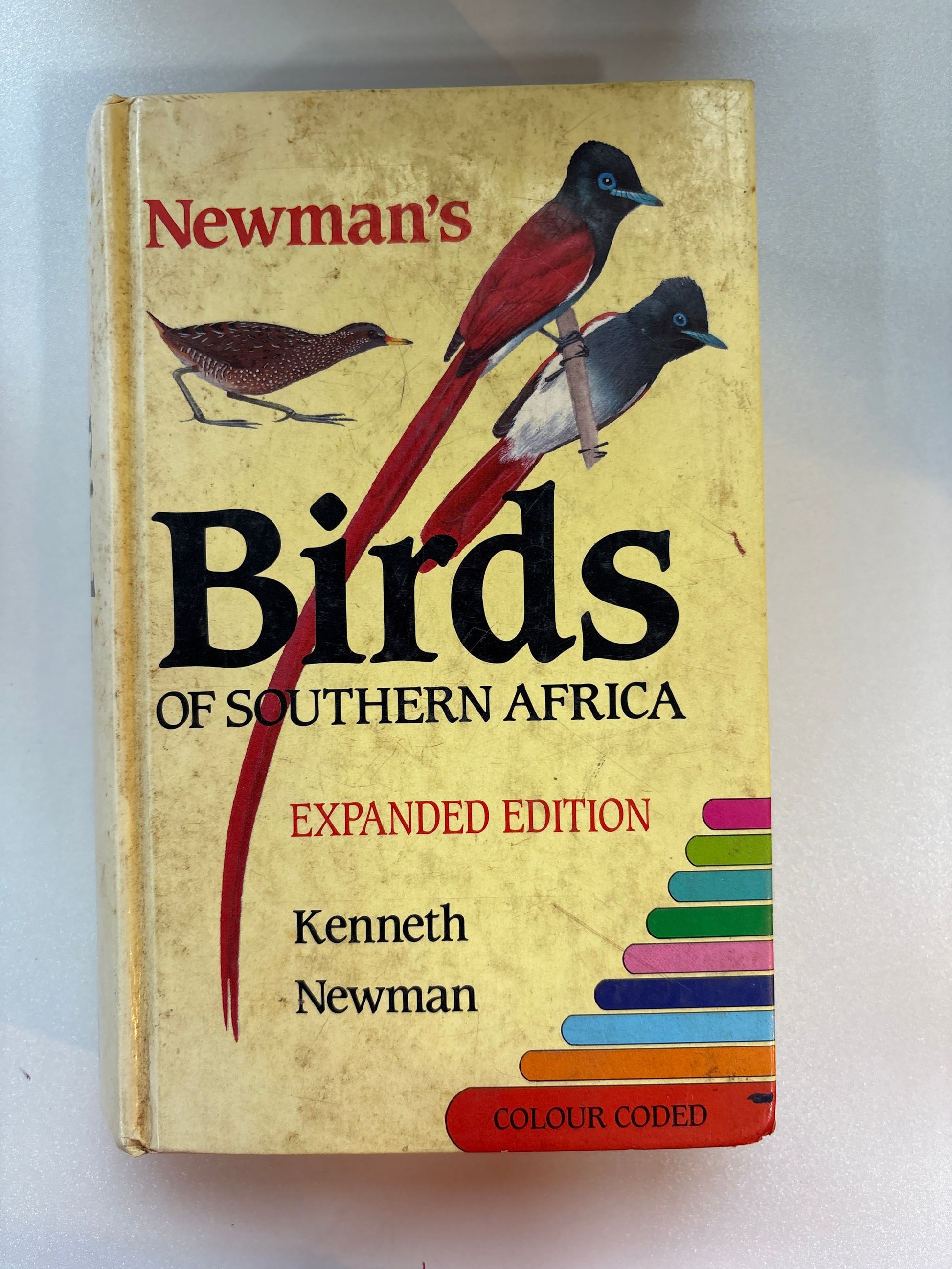 Book titled 'Birds of Southern Africa' by Kenneth Newman on a white background