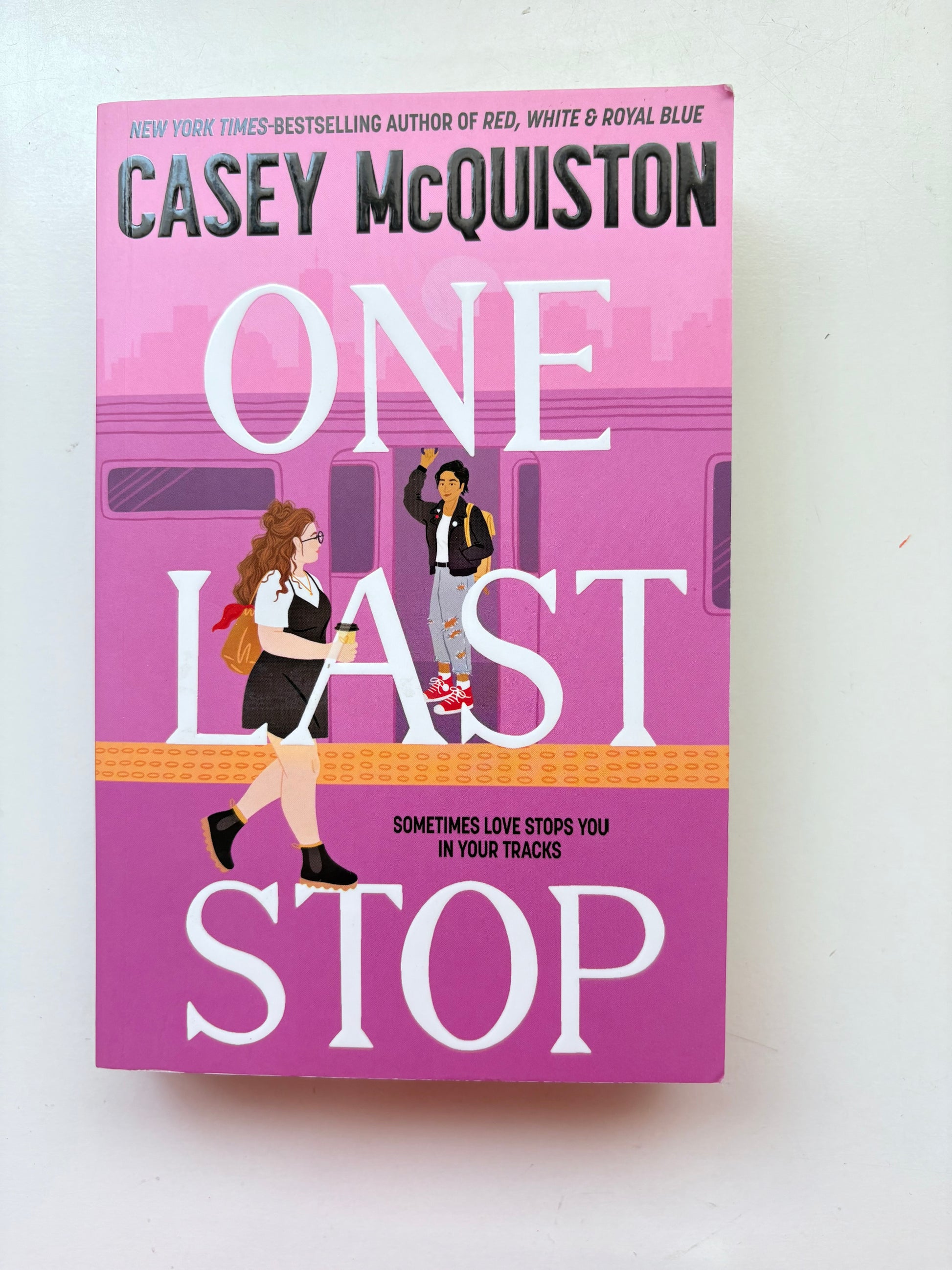 Book cover of 'One Last Stop' by Casey McQuiston on a white background