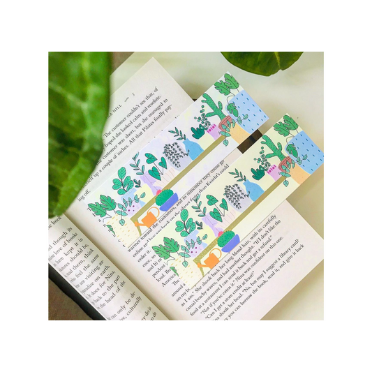 Bookmarks with plant designs on an open book