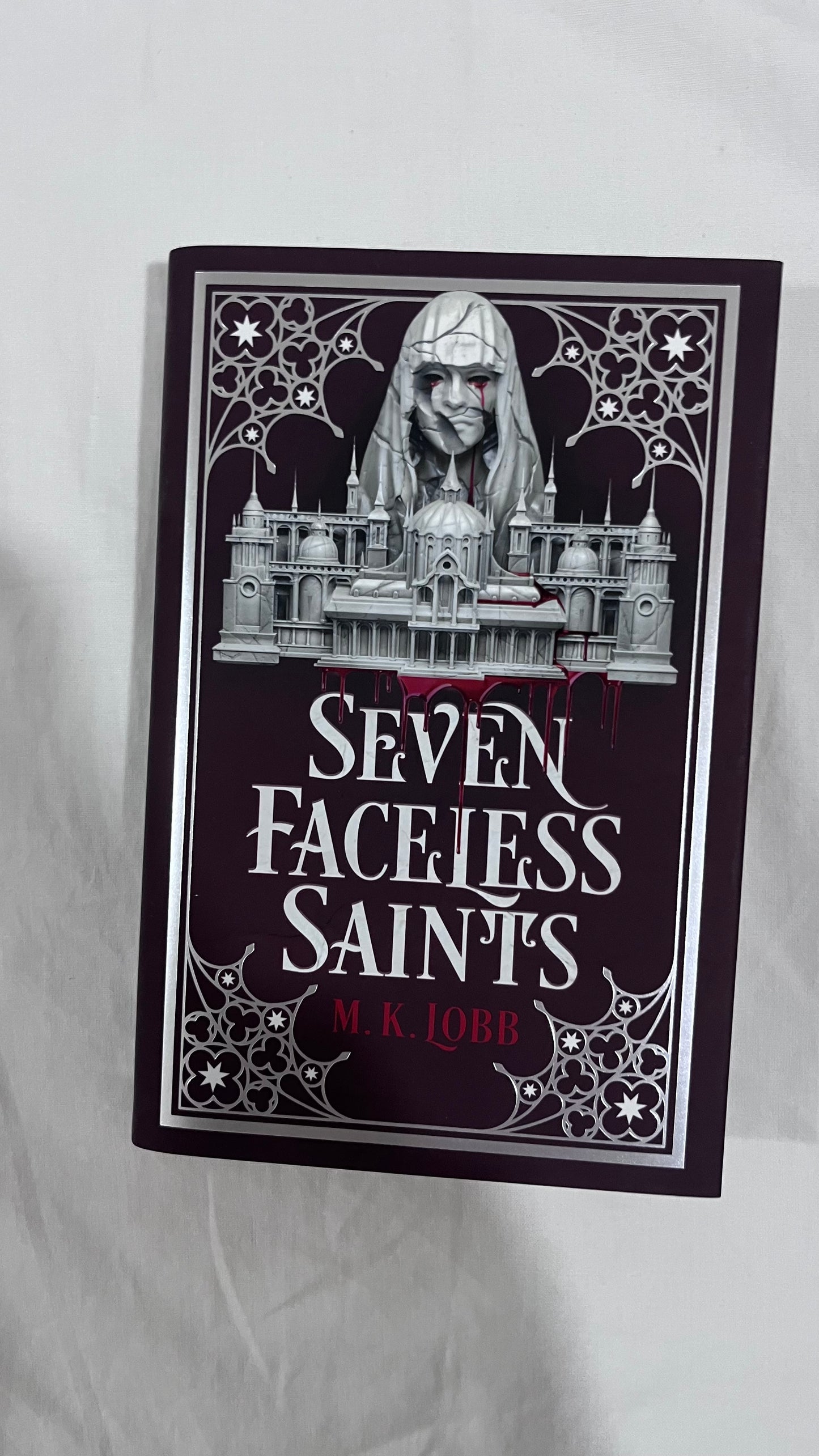 Seven Faceless Saints – A FairyLoot exclusive edition of a gripping dark fantasy.