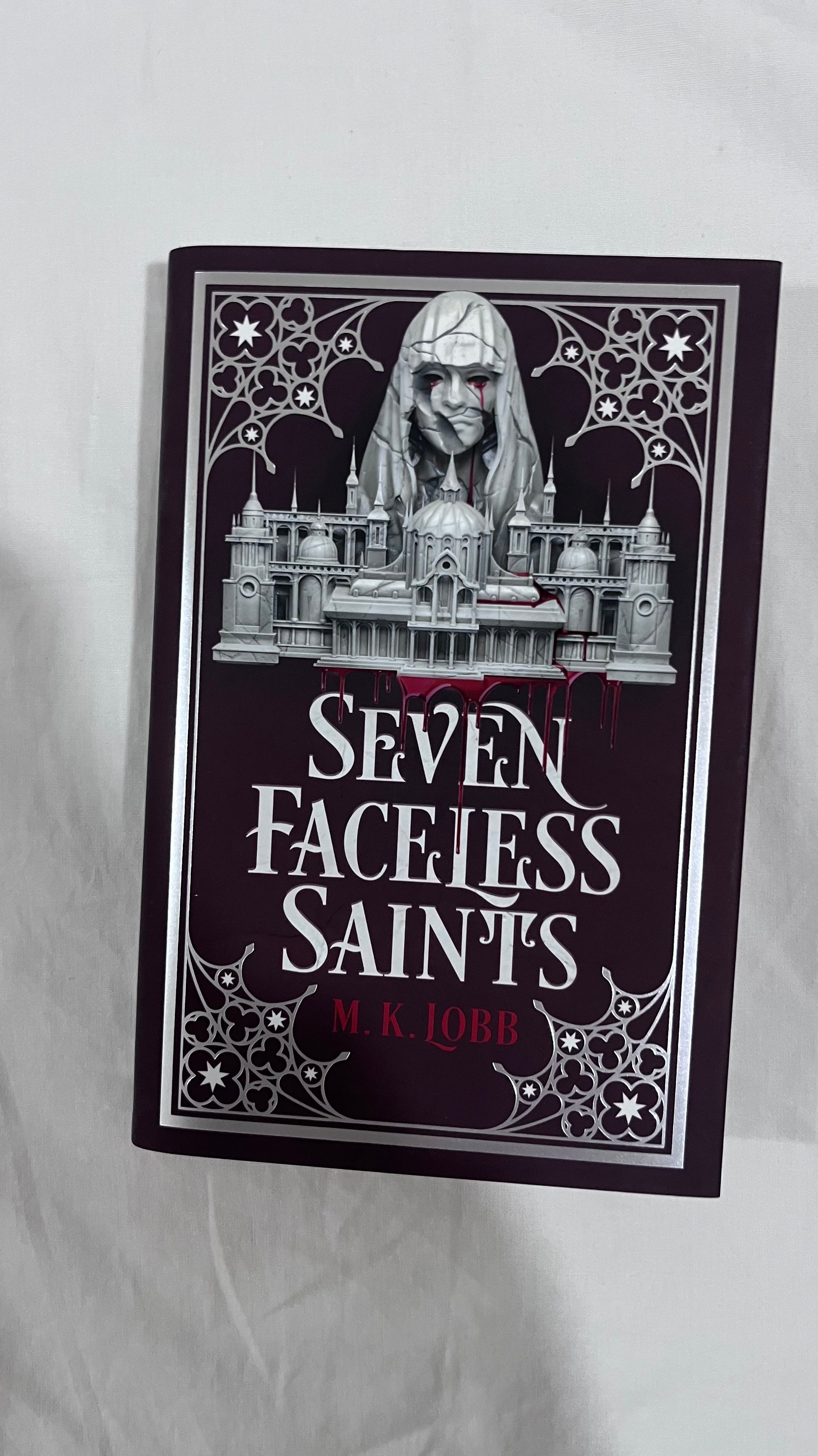 Seven Faceless Saints – A FairyLoot exclusive edition of a gripping dark fantasy.