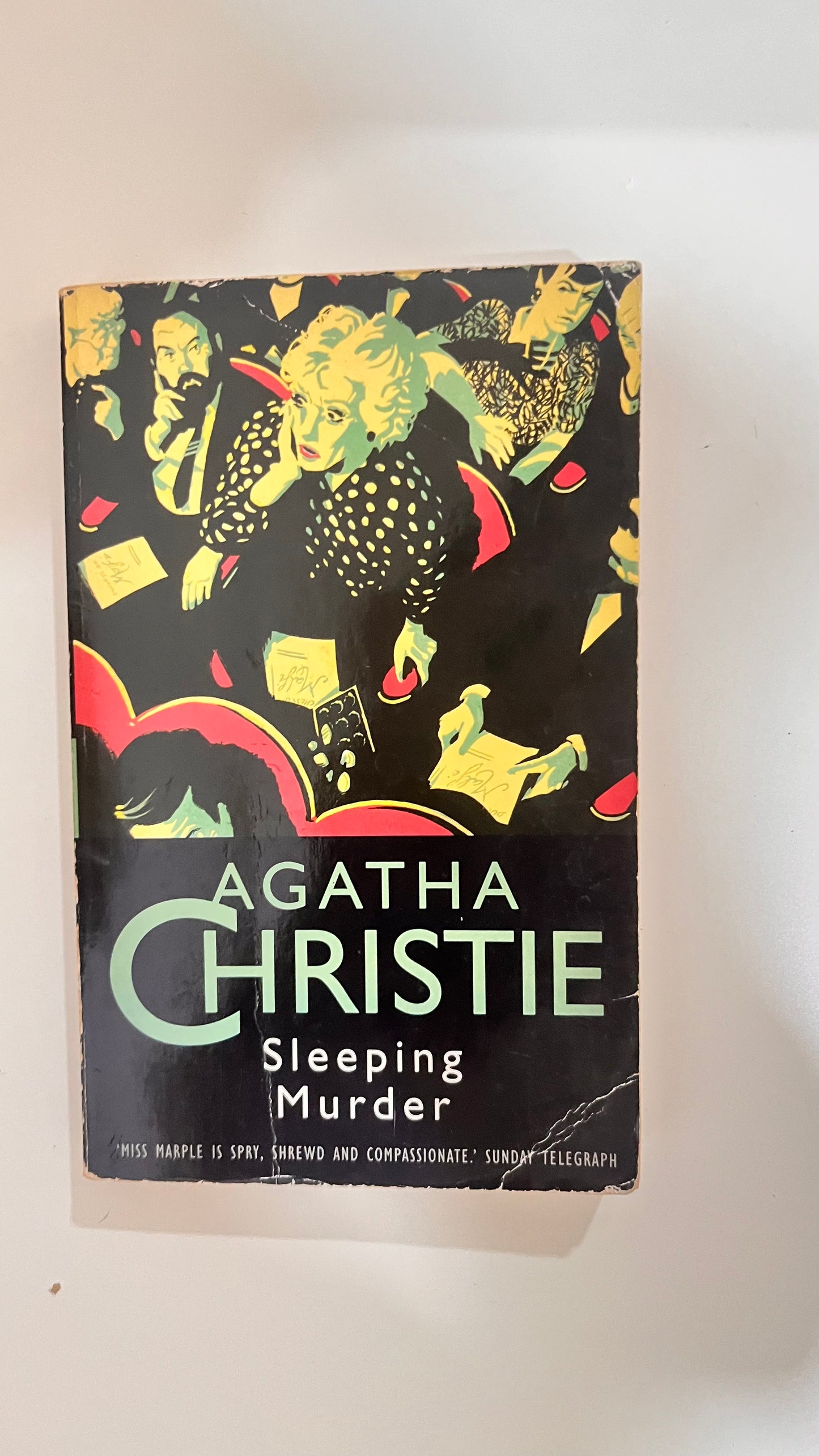 Paperback of Sleeping Murder by Agatha Christie, with a classic vintage cover.

