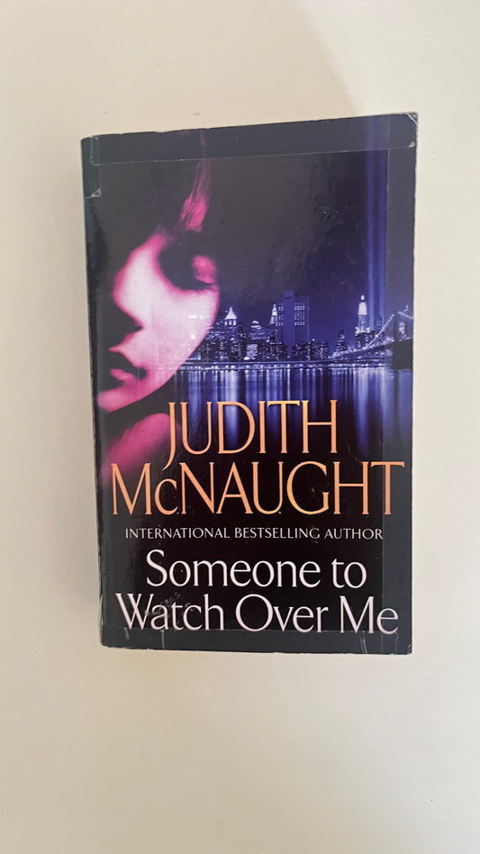 Paperback of Someone to Watch Over Me by Judith McNaught, featuring an intense and suspenseful cover design.

