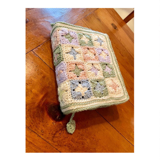  Book sleeve made with star granny square crochet blocks